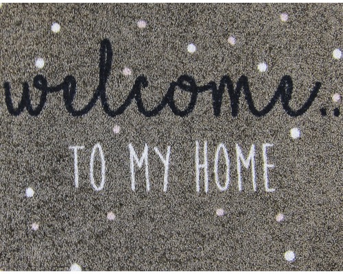 Fußmatte mit der Aufschrift Willkommen zu Hause