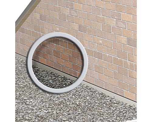 Vue détaillée d''un mur de maison avec maçonnerie et gravier