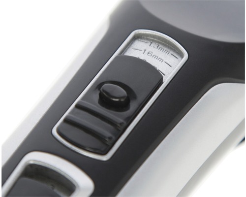 Gros plan du réglage de longueur d''une tondeuse à cheveux avec indication en millimètres