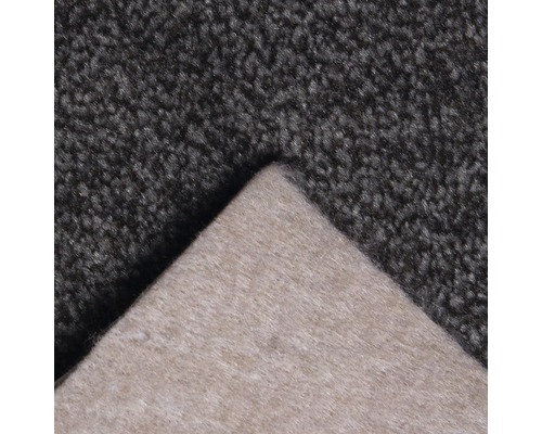 Vue détaillée d''un tapis gris foncé avec envers textile