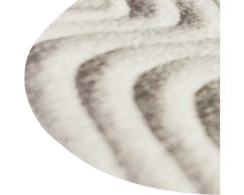 Gros plan d''une surface de table avec un motif ondulé