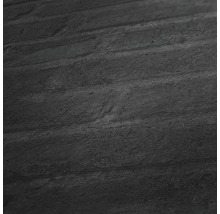 Gros plan d''un carreau mural noir aspect pierre.