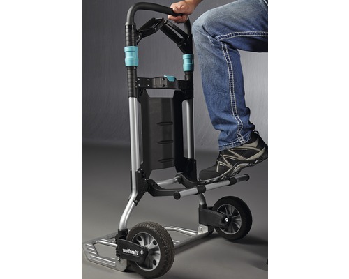 Wolfcraft Transporthilfe mit Trittbrett und Person.