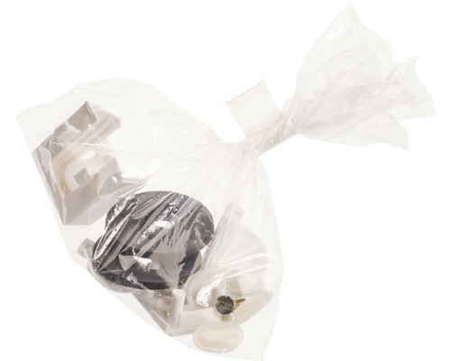 Ersatzteilset in einer transparenten Plastiktüte