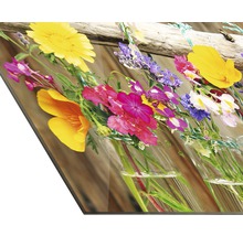 Dekorative Glasbild mit Blumenmotiven in Gläsern