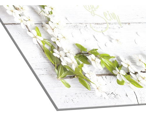 Toile décorative avec motif de branche fleurie pour une ambiance printanière