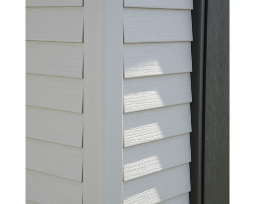 Vue détaillée d''une façade avec revêtement synthétique et profil d''angle