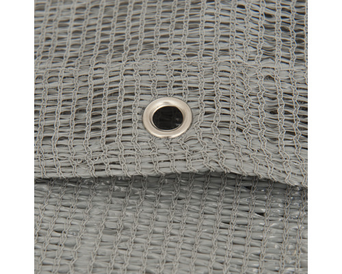 Gros plan d''un brise-vue gris avec oeillet