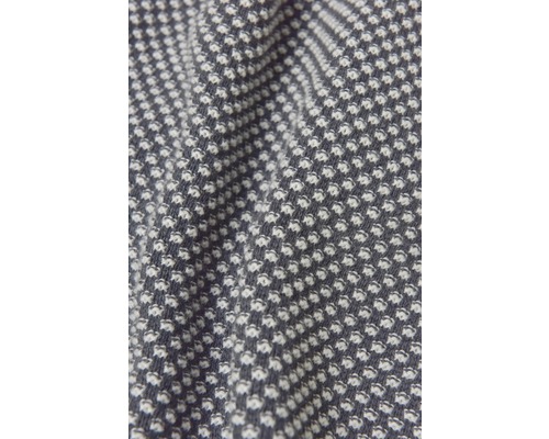 Detailaufnahme eines Textilstoffs mit Punktmuster