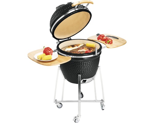 Keramikgrill mit Lebensmitteln und Seitentischen auf Rädern