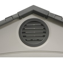 Vue détaillée d''un abri de jardin avec grille d''aération ronde