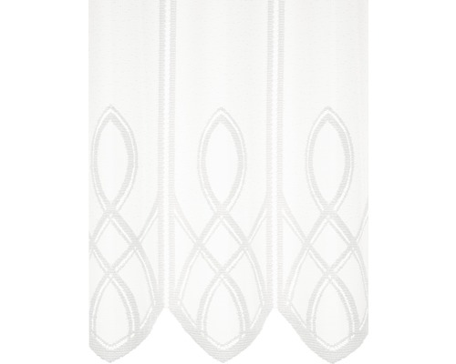 Détail de rideau de fenêtre blanc avec motif décoratif