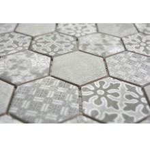 Gros plan de carreaux de mosaïque hexagonaux avec motifs