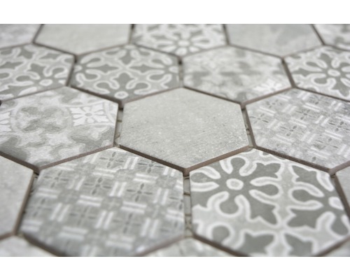 Gros plan de carreaux de mosaïque hexagonaux avec motifs