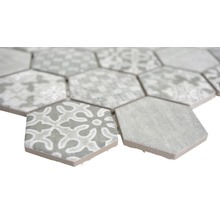Gros plan de carreaux hexagonaux avec différents motifs