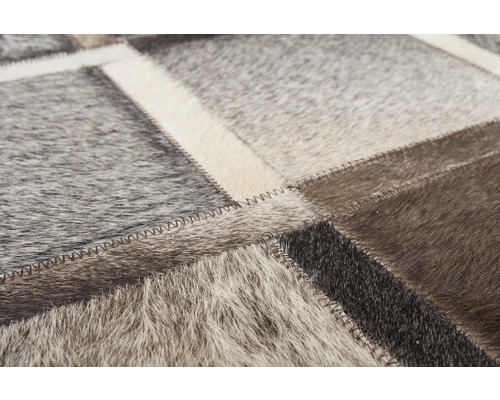Teppich aus Lederflicken mit Zickzacknaht