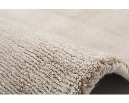 Vue détaillée d''un tapis beige texturé