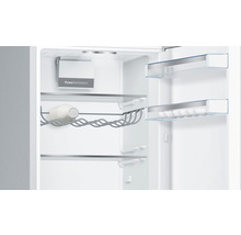 Intérieur d''un réfrigérateur avec éclairage LED, clayettes, support à bouteilles et Power Ventilation