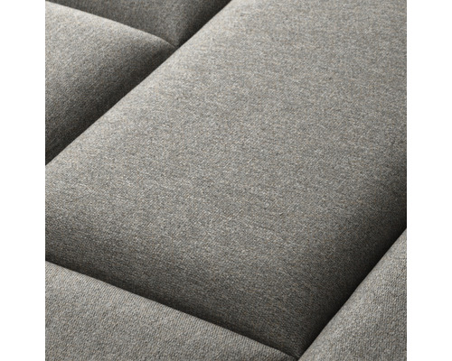 Gros plan d''un coussin de canapé gris.