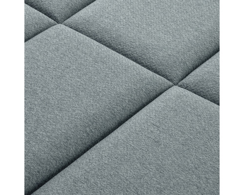 Nahaufnahme einer gepolsterten Wandpaneele mit quadratischem Muster