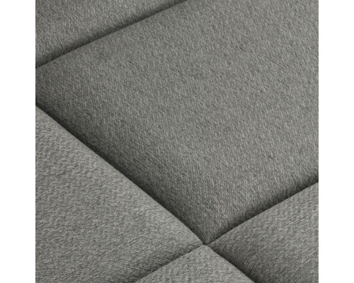 Nahaufnahme eines gepolsterten Möbelstücks mit Stoffbezug und gestepptem Muster