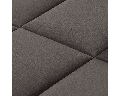 Gros plan d''un meuble rembourré avec des compartiments carrés