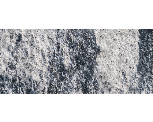 Nahaufnahme einer Betonmauer mit grober Textur