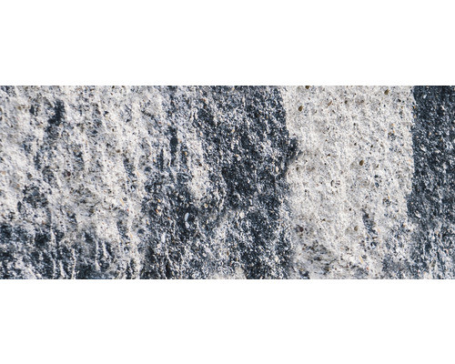 Gros plan d''un mur en béton avec une surface rugueuse