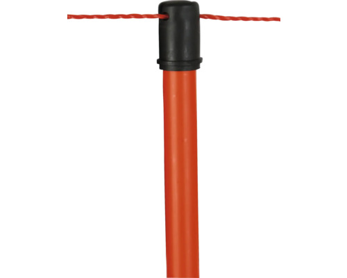 Vue détaillée d''un piquet de clôture de pâturage avec œillet de fil