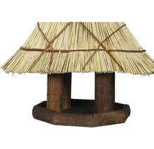 Mangeoire en bois avec toit de chaume