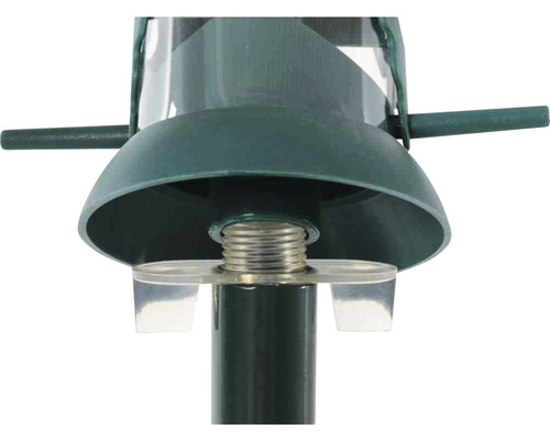 Vue détaillée d''une mangeoire à oiseaux avec ressort métallique et éléments en plastique