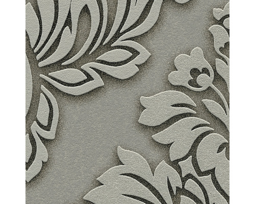 Vue détaillée d''un papier peint vinyle gaufré avec un motif floral.