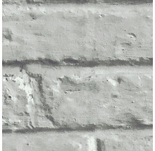 Gros plan d''un mur de briques grises pour l''intérieur