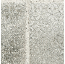 Betonpflasterstein mit floralem Muster