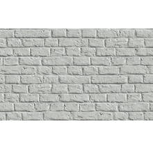 Gros plan d''un papier peint en briques blanches