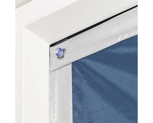 Store occultant avec ventouse fixé au cadre de la fenêtre