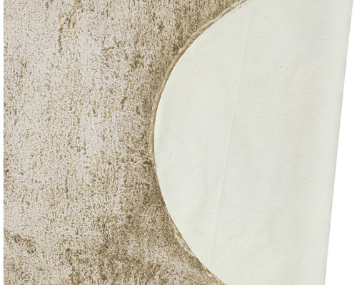 Vue détaillée d''un tapis rond à poils longs et à envers de tapis