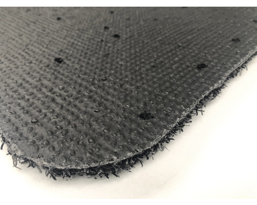 Morceau de gazon synthétique avec structure à picots et fonction de drainage