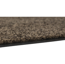 Vue détaillée d''un paillasson avec surface textile et bordure en caoutchouc