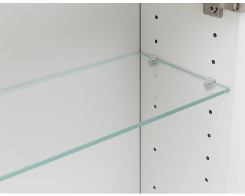 Vue intérieure d''une armoire avec une étagère en verre