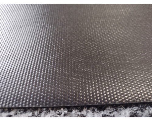 Nahaufnahme einer Bodenmatte mit Noppenstruktur