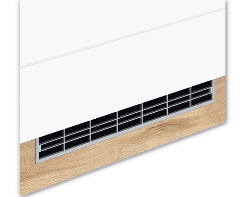 Vue détaillée d''une grille d''aération dans un meuble en bois