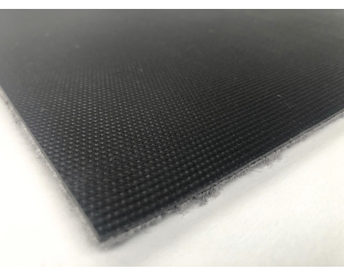 Gros plan d''une dalle de moquette noire.
