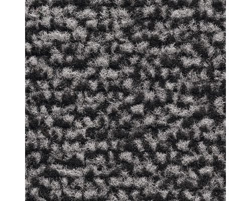 Nahaufnahme eines grauen Teppichs mit Noppenstruktur