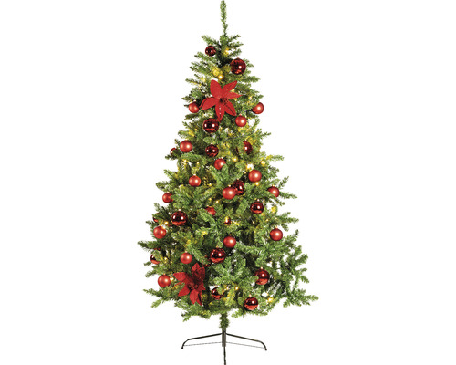 Geschmückter Weihnachtsbaum mit Kugeln und Blumen auf Ständer