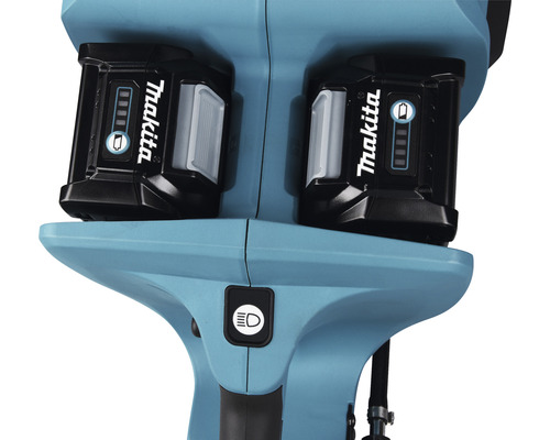 Detailaufnahme eines Werkzeugs mit zwei eingesetzten Makita Akkus und einem Lichtschalter.