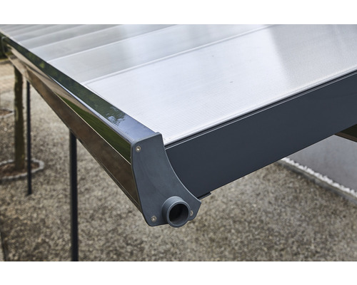 Vue détaillée d''un abri de voiture avec des cadres gris et un toit transparent