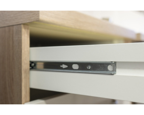 Gros plan d''un meuble avec tiroir et coulisse