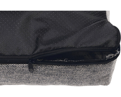 Detailansicht eines Hundebetts mit Reißverschluss und rutschfester Unterseite