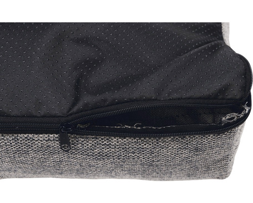 Detailansicht eines Hundebetts mit Reißverschluss und rutschfester Unterseite